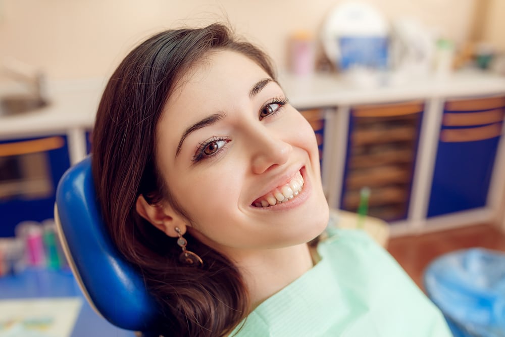 From Dental Botox to Dermal Fillers: Treatments For You in Canton, Patient happy after her dental treatment, Dental Solutions of Mississippi dentist in Canton MS, Dr. Ruth Roach Morgan Dr. Jessica Morgan, Cosmetic Dentistry